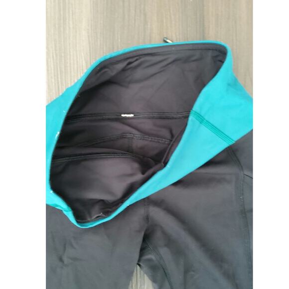 Lululemon leggings speed up lights out black teal eyelet lzip pocket side size 4 - Picture 4 of 6